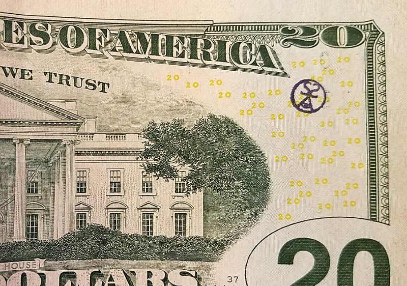 SSoIH stamped on a $20 note.